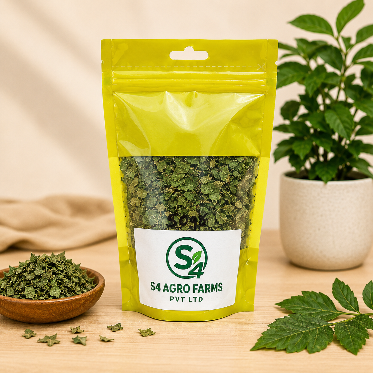 Yellow package of green herbs with S4 Agro Farms label on a wooden surface, plant in background