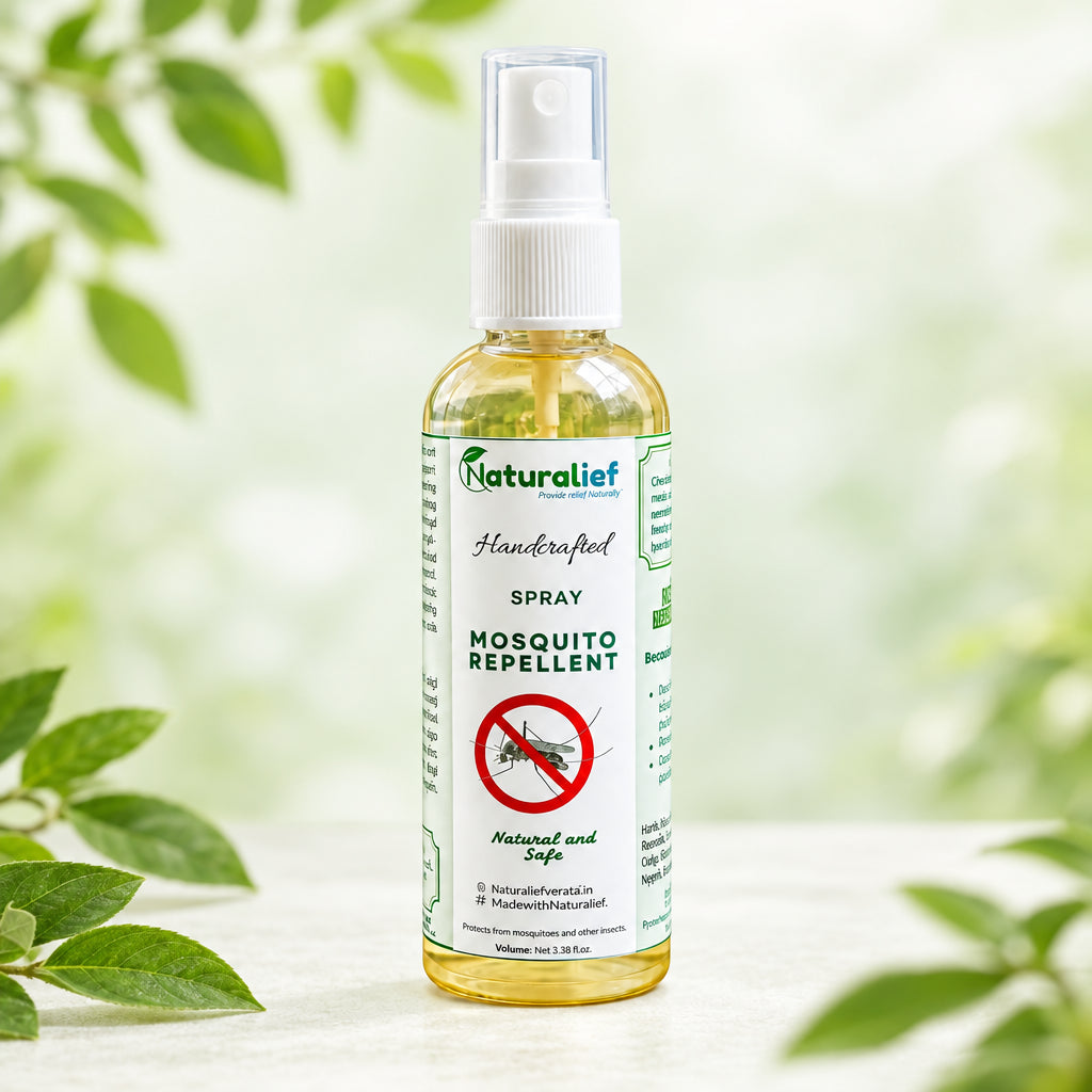 A bottle of Naturalief Handcrafted Mosquito Repellent spray, placed on a rustic wooden slice with green leaves and a white flower in the foreground, set against a soft-focus background of green plants.