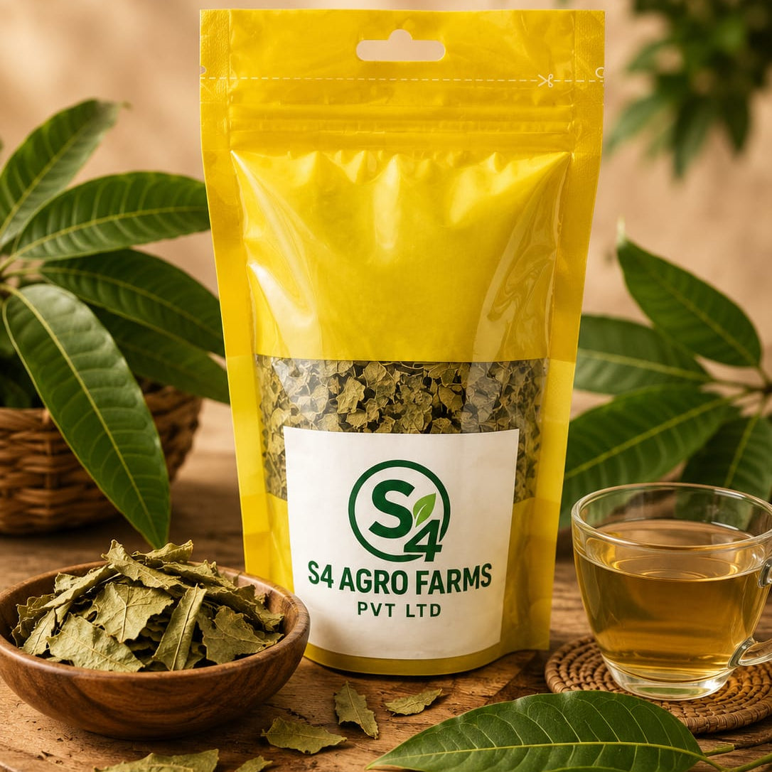 Yellow package of S4 Agro Farms with a bowl of dried leaves and a glass of tea on a wooden surface.